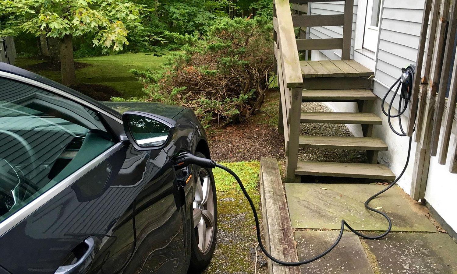 Electric vehicle charging at a home level 2 charger.